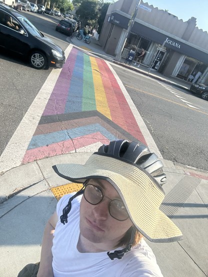 me in front of pride flag crosswalk on broadway avenue in long beach